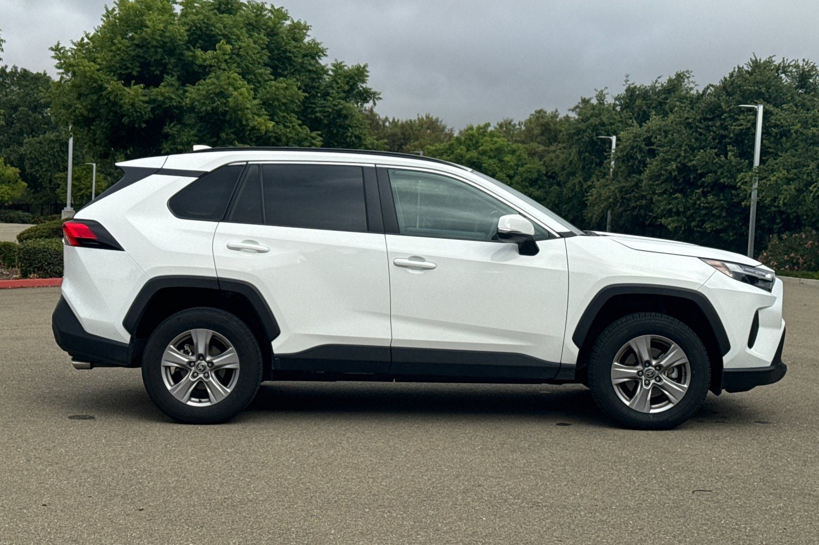 2025 Toyota RAV4 — rear three-quarter view