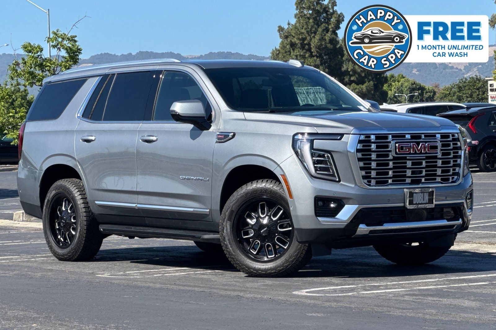 2026 GMC Yukon Denali in Sterling Metallic — front three-quarter view