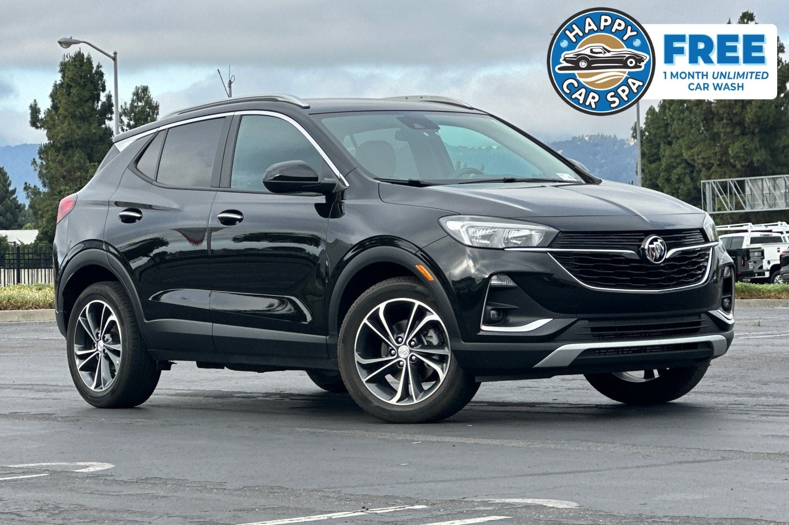 2023 Buick Encore GX Select in Ebony Twilight Metallic — front three-quarter view