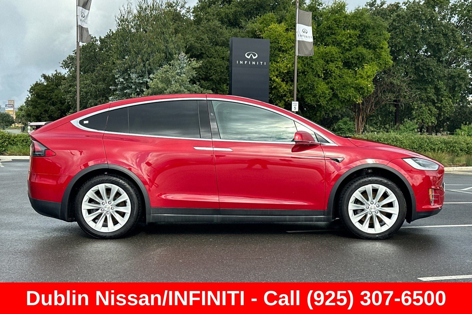 2021 Tesla Model X — rear three-quarter view
